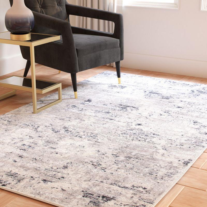 Amelia Abstract Grey & Ivory Round Synthetic Area Rug