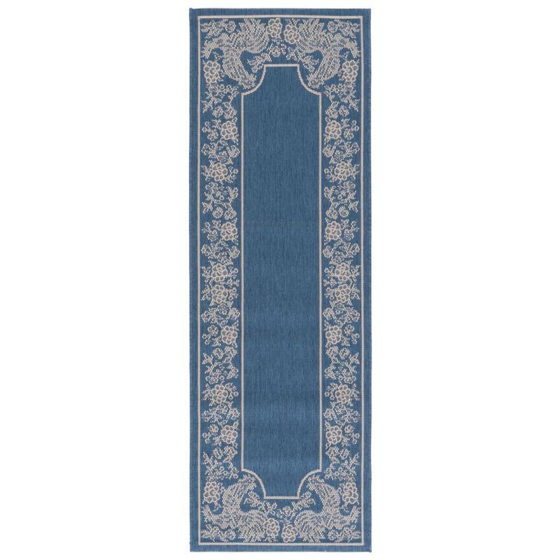 28" Blue and Natural Synthetic Reversible Flat Woven Rug