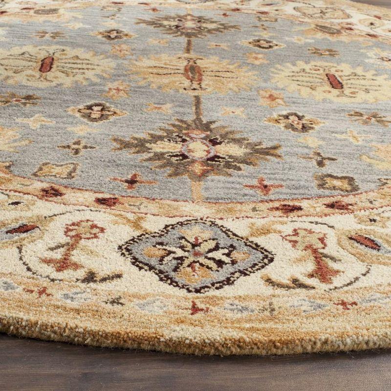 Antiquity Oriental Handmade Tufted Wool Blue/Ivory/Red Area Rug