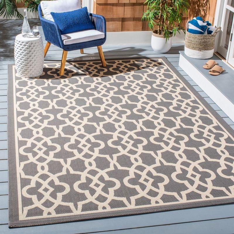 Grey Beige Quatrefoil 5' x 7' Easy-Care Synthetic Area Rug