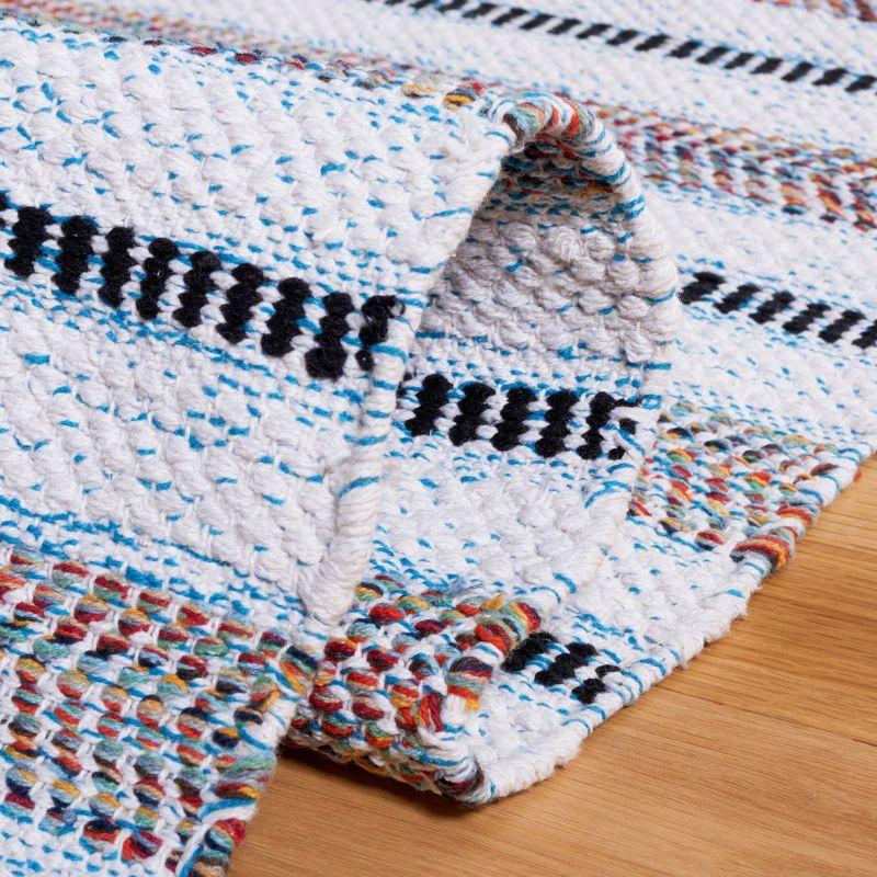 Ivory and Turquoise Handwoven Cotton Area Rug