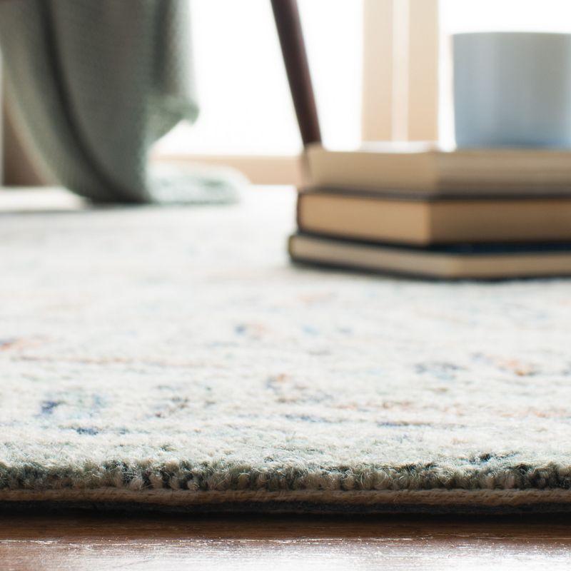 Ivory and Blue Hand-Tufted Wool 4' x 6' Area Rug