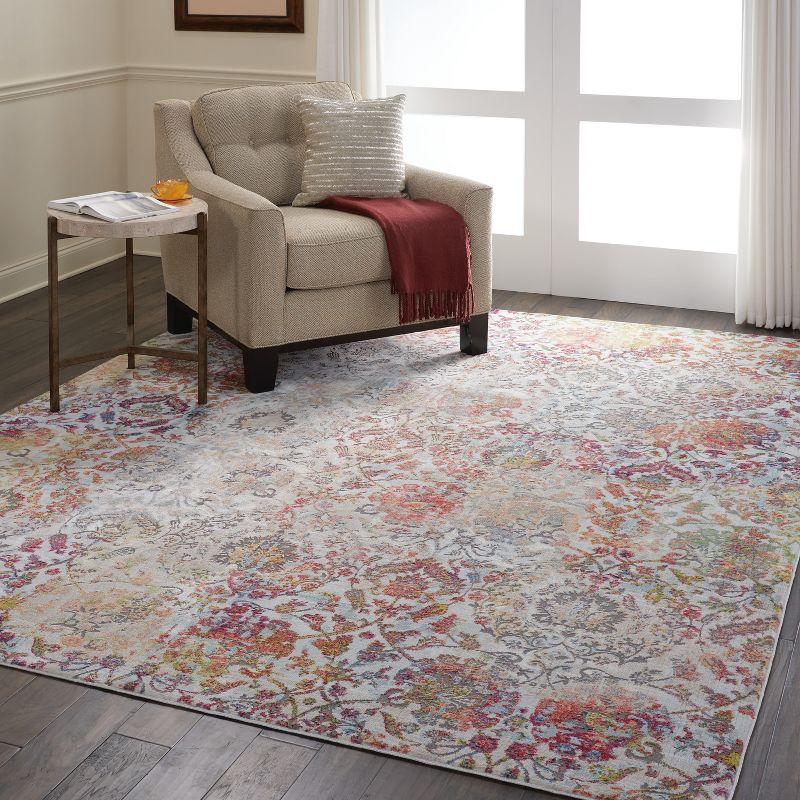 Ivory and Orange Floral Synthetic 8' x 10' Easy Care Area Rug