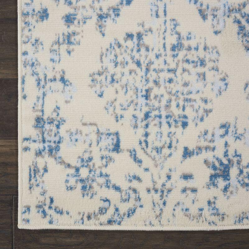 Ivory and Blue Distressed Damask 3' x 5' Area Rug