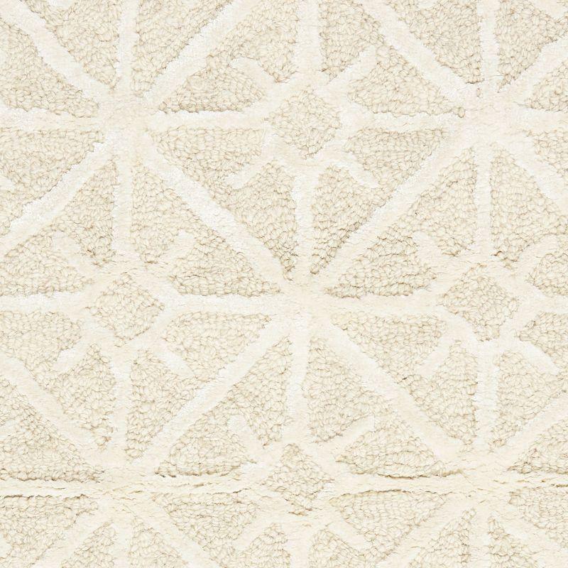 Geometric Handmade Tufted Ivory Area Rug
