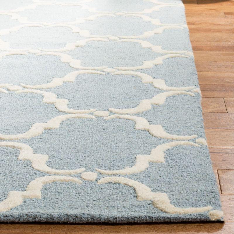 Hand-Tufted Round Wool Rug in Light Blue/Ivory, 3' x 5'