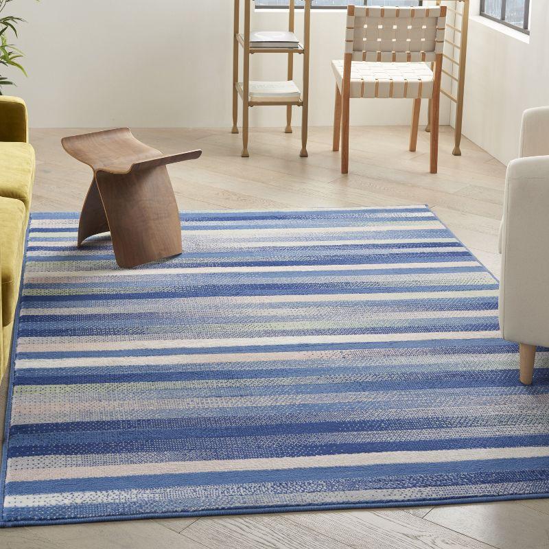 Blue Multicolor Geometric 6' x 9' Synthetic Area Rug