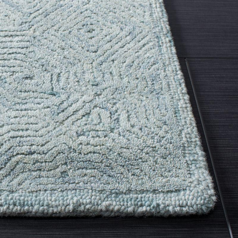 Ikat IKT506 Hand Tufted Area Rug - Aqua - 5'x8' - Safavieh