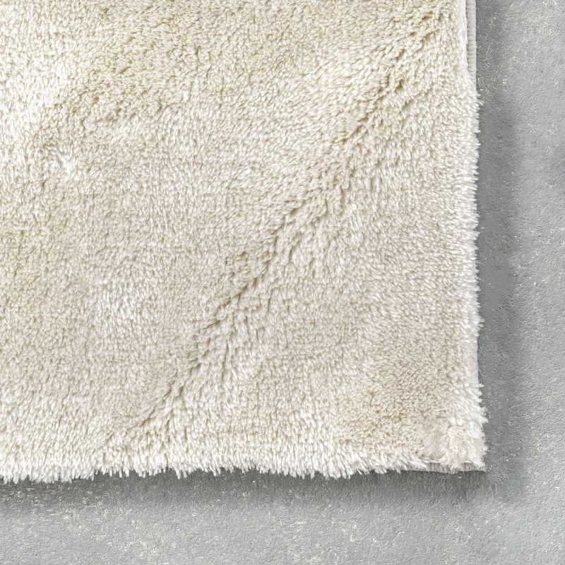 nuLOOM 6' x 9' Cozy Plush SuperiorWash Area Rug, Machine Washable, Non-Slip, Soft Fluffy Shag Carpet for Living Room Bedroom Nursery, Loni Cream