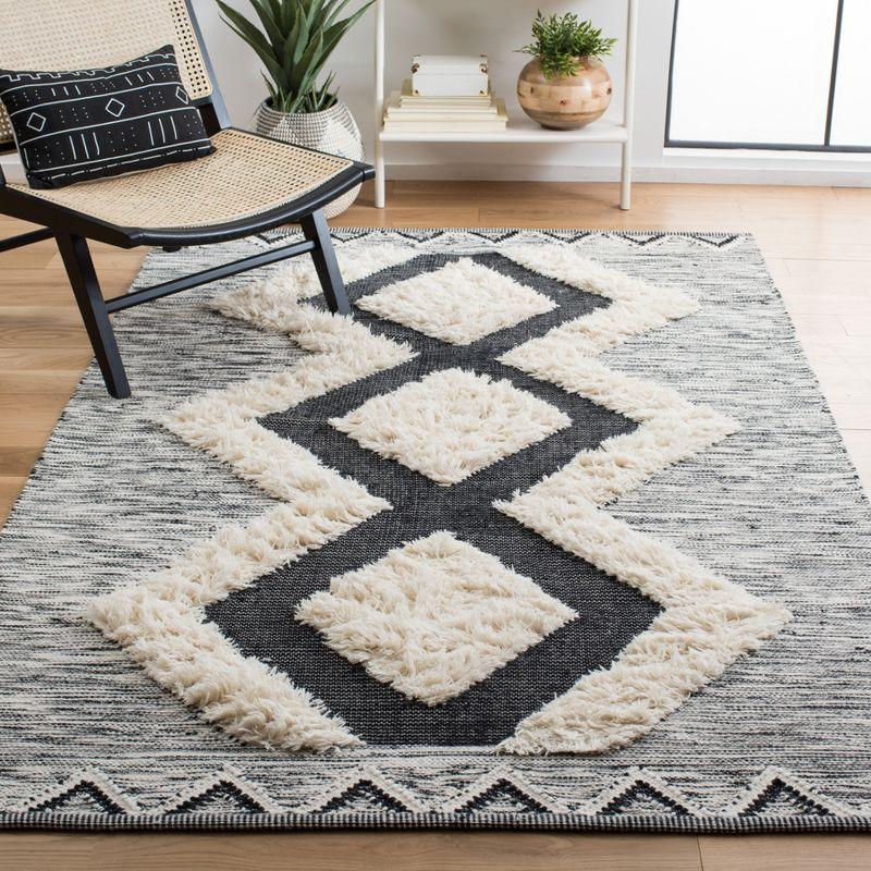 Kenya Tribal Essence Hand-Knotted Black Wool Area Rug - 6' x 9'