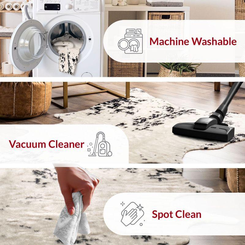 Nuloom Marcia SpinClean Machine Washable Faux Cowhide Area Rug, Shaped 3' 10" x 5', Black