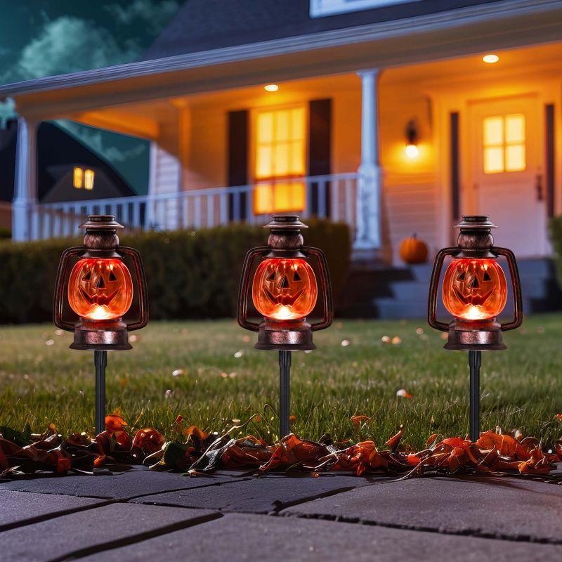 Northlight Seasonal Orange Flickering Halloween Jack O' Lantern Pathway Markers 16.75" (Set of 3)
