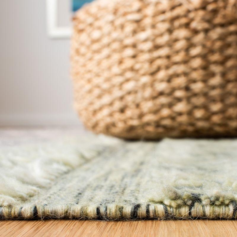Casablanca CSB555 Hand Woven Wool Area Rug - Turquoise/Pink- 5' X 8' - Safavieh.