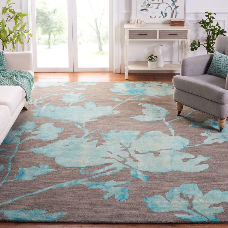 Hand-Tufted Grey Turquoise Round Wool 9' x 12' Area Rug