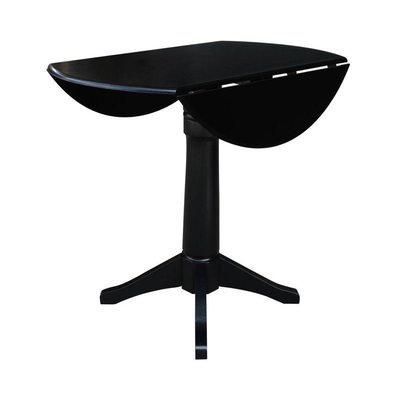 Sandon Round Dual Drop Leaf Pedestal Table Black - International Concepts