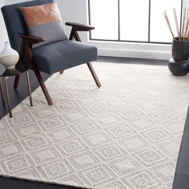 Marbella Black and Ivory Wool Flat Woven Area Rug