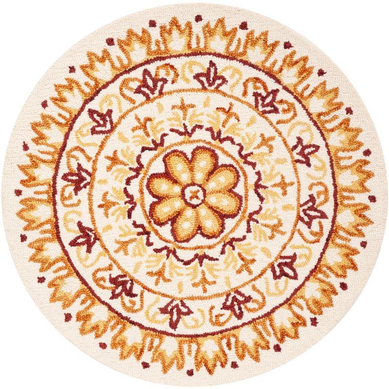 Novelty NOV607 Hand Tufted Area Rug - Ivory/Gold - 4' round - Safavieh.