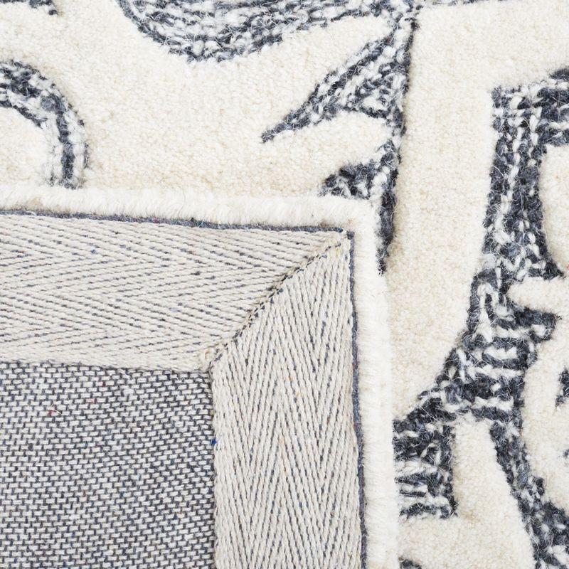 Metro MET859 Hand Tufted Indoor Area Rug - Black/Ivory - 6'x6' - Safavieh