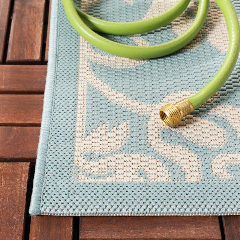 Aqua Cream Courtyard 79" Easy-Care Synthetic Area Rug