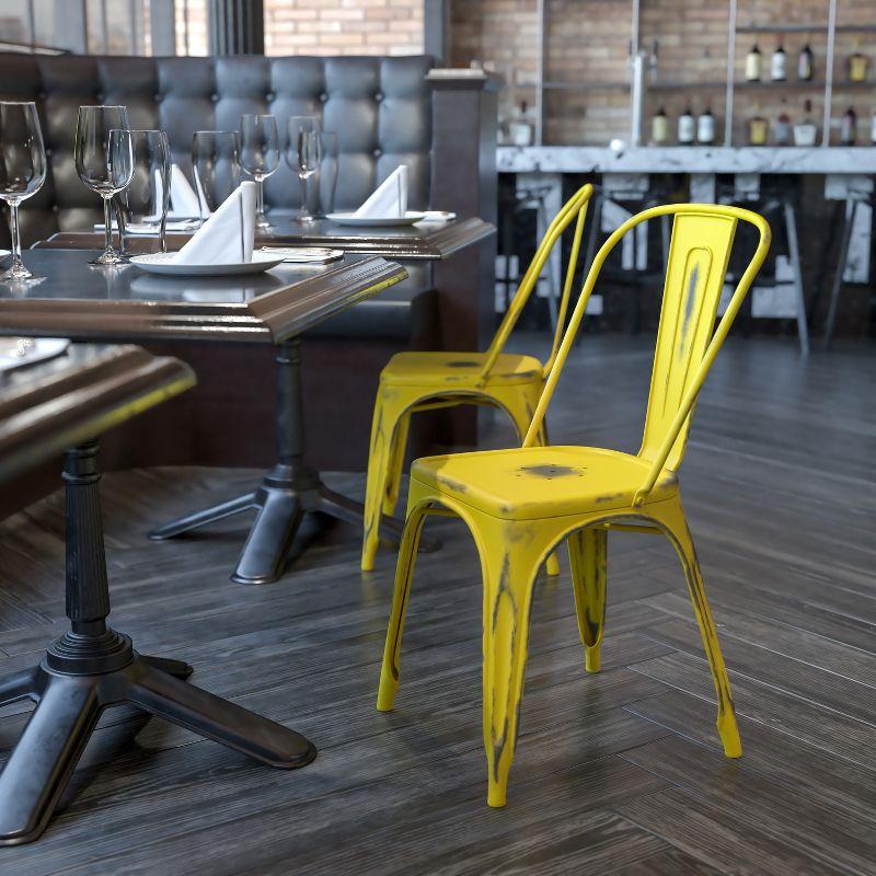 Distressed Yellow Metal Armless Indoor-Outdoor Stackable Chair