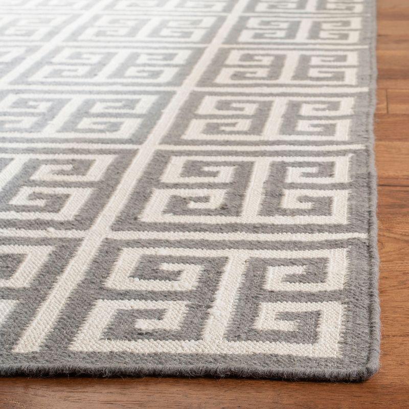 Dhurries DHU626 Hand Woven Flat Weave Area Rug Grey / Ivory 9' X 12' - Safavieh.