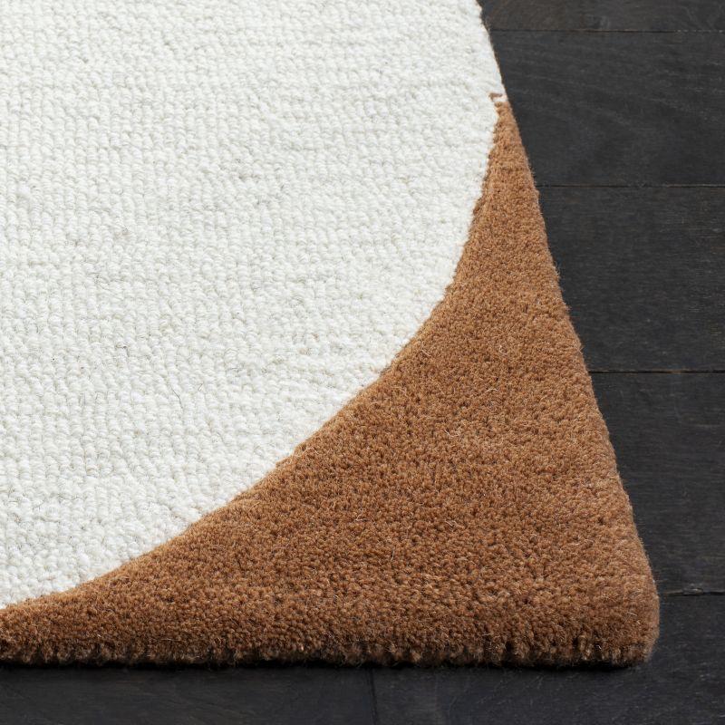 Rodeo Drive RD856 Hand Tufted Indoor Accent Rug - 4'x6' - Ivory/Black - Safavieh