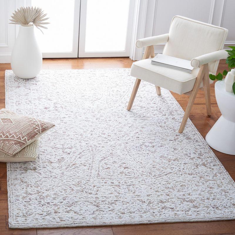 Ivory and Beige 3' x 5' Hand-Tufted Wool Area Rug