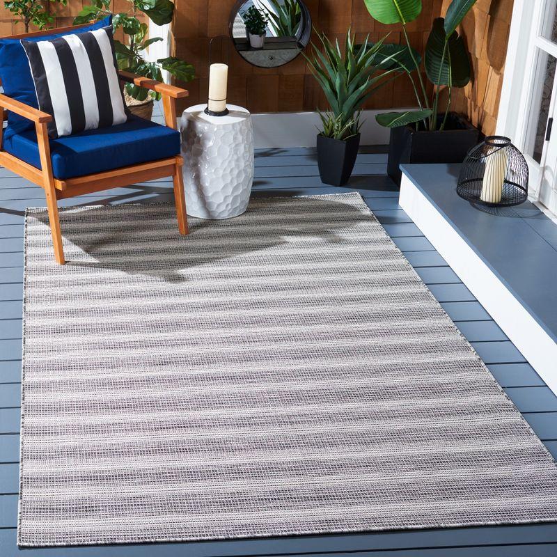 Elegant Hampton 4' x 6' Black/Ivory Synthetic Indoor/Outdoor Area Rug