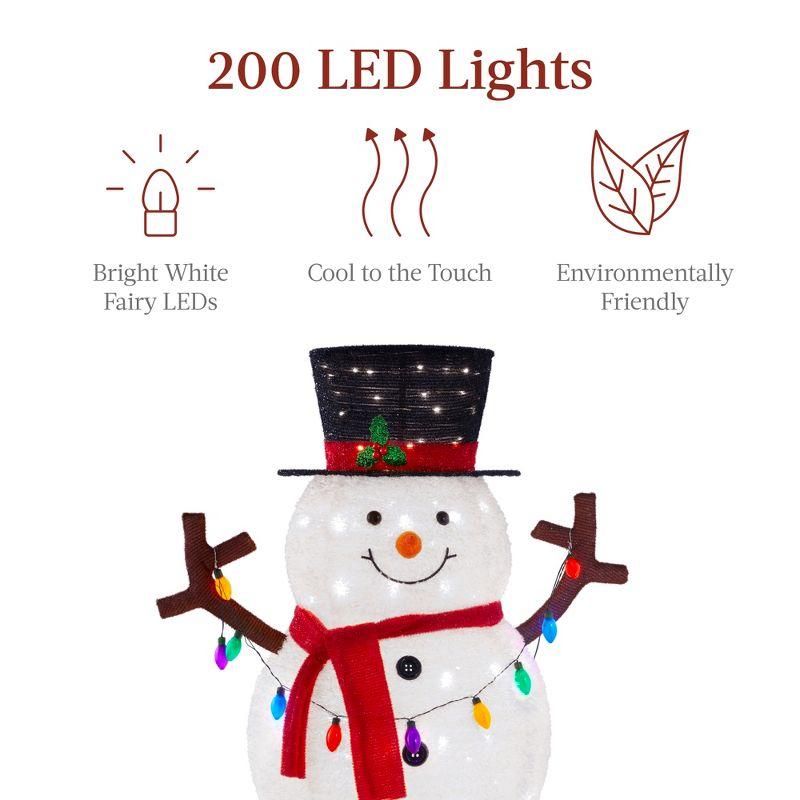 The Holiday Aisle® The Holiday Aisle® 5Ft Lighted Pop-Up Snowman, Outdoor Christmas Holiday Decoration W/ 200 LED Lights, Hat, Scarf
