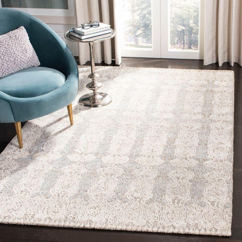 Glamour GLM536 Hand Tufted Chic Area Rug  - Safavieh