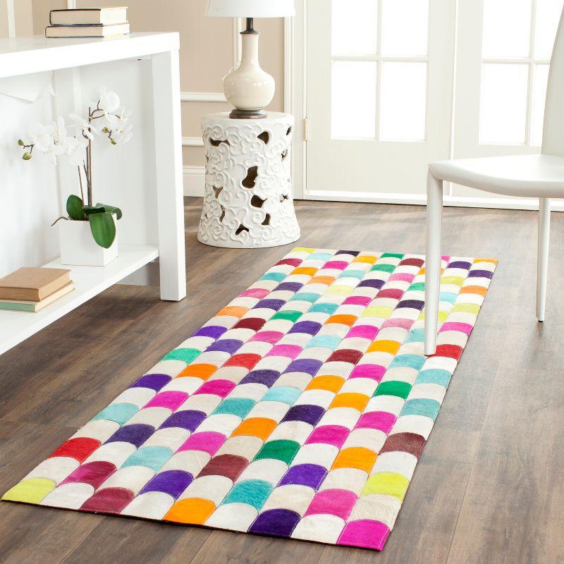 Ivory and Multicolor Geometric Cowhide Area Rug