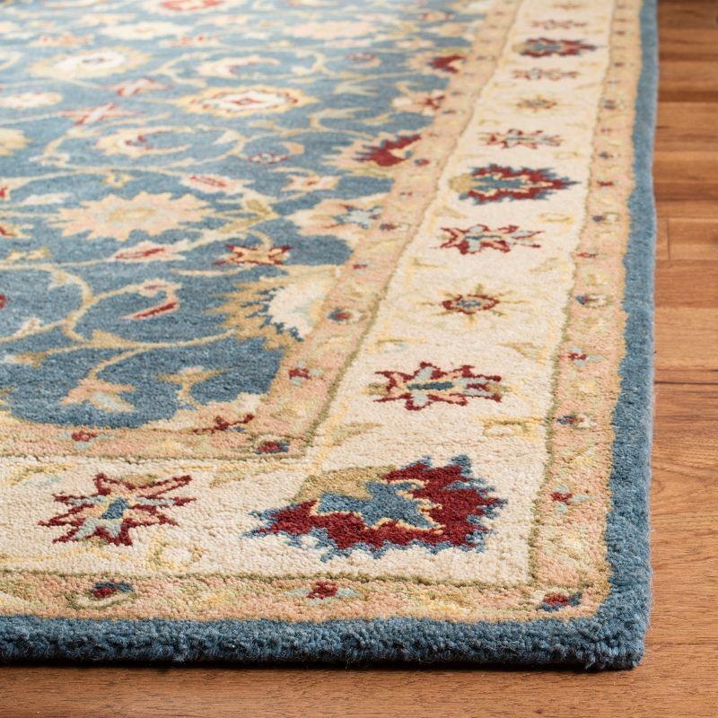 Antiquity Inspired Blue and Beige Handmade Wool Area Rug - 7'6" x 9'6"