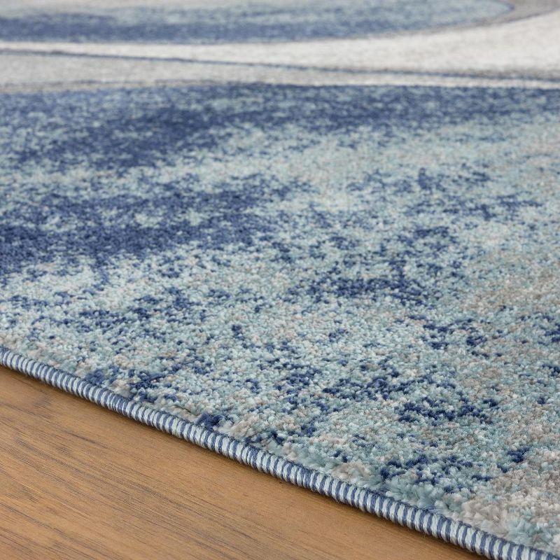 Abstract Swirls 8' x 10' Blue Synthetic Area Rug