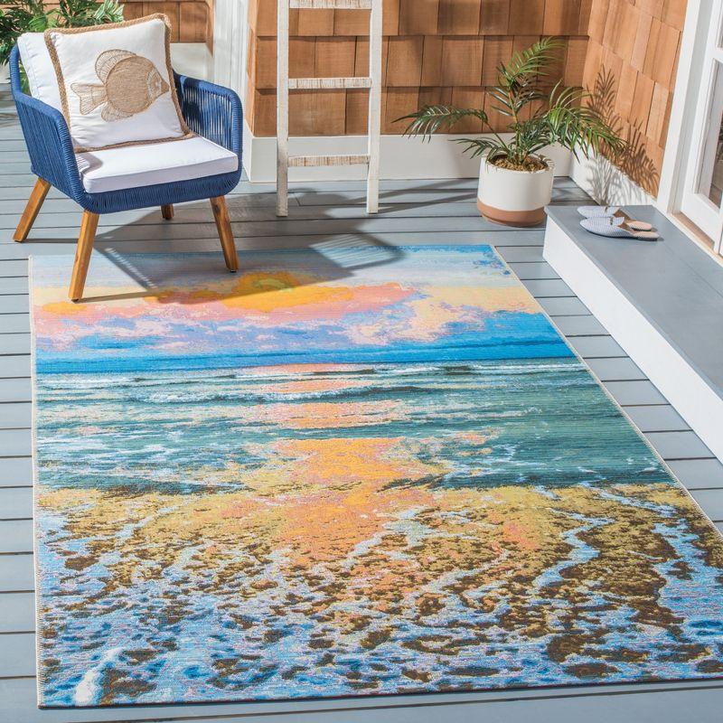 Coastal Breeze Blue and Gold Synthetic 6'6" x 9'4" Outdoor Rug