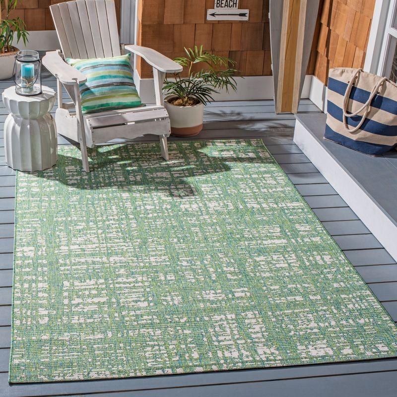 Ivory Synthetic Easy-Care Rectangular Outdoor Rug - 4' x 5'7"