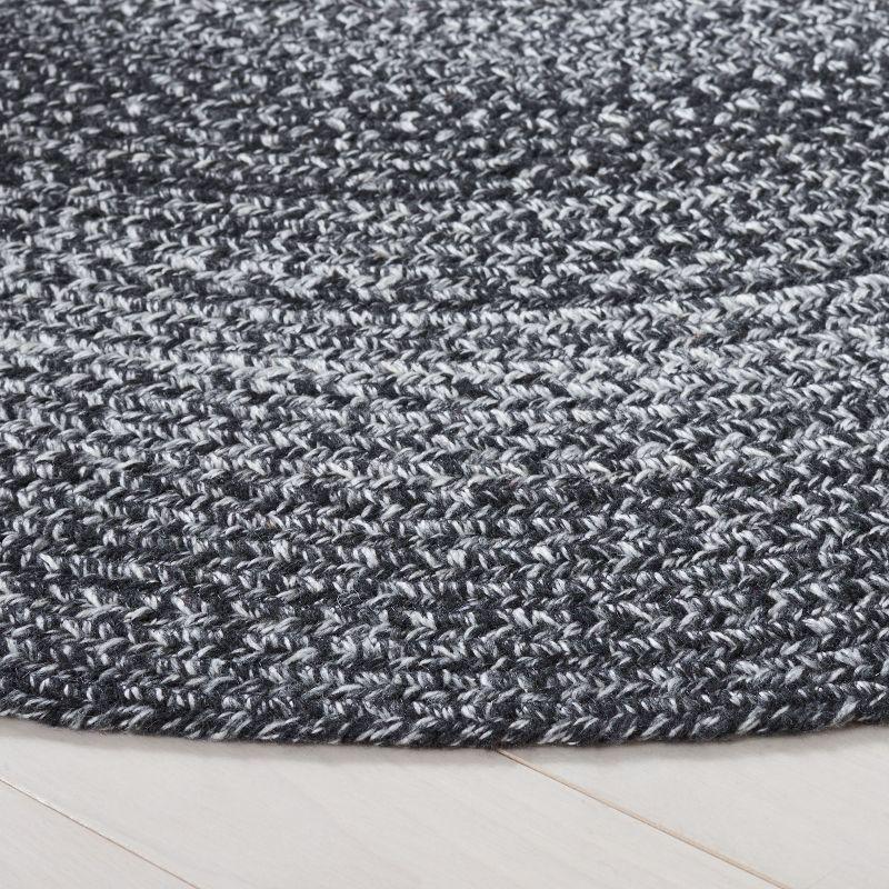 Braided BRD804 Hand Woven Area Rug - Black/Ivory - 4' round - Safavieh.