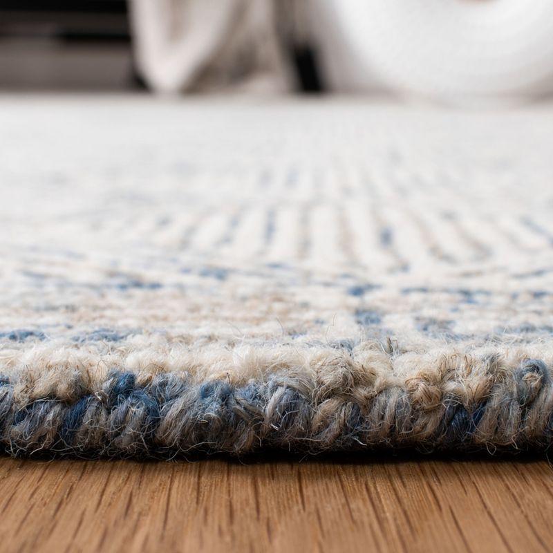 Handmade Blue Wool Tufted 5' x 8' Area Rug