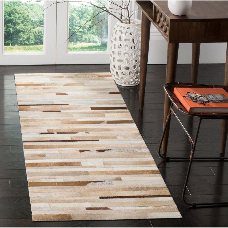 Studio Leather STL218 Hand Woven Indoor Runner Rug - Tan/Ivory - 2'3"x9' - Safavieh