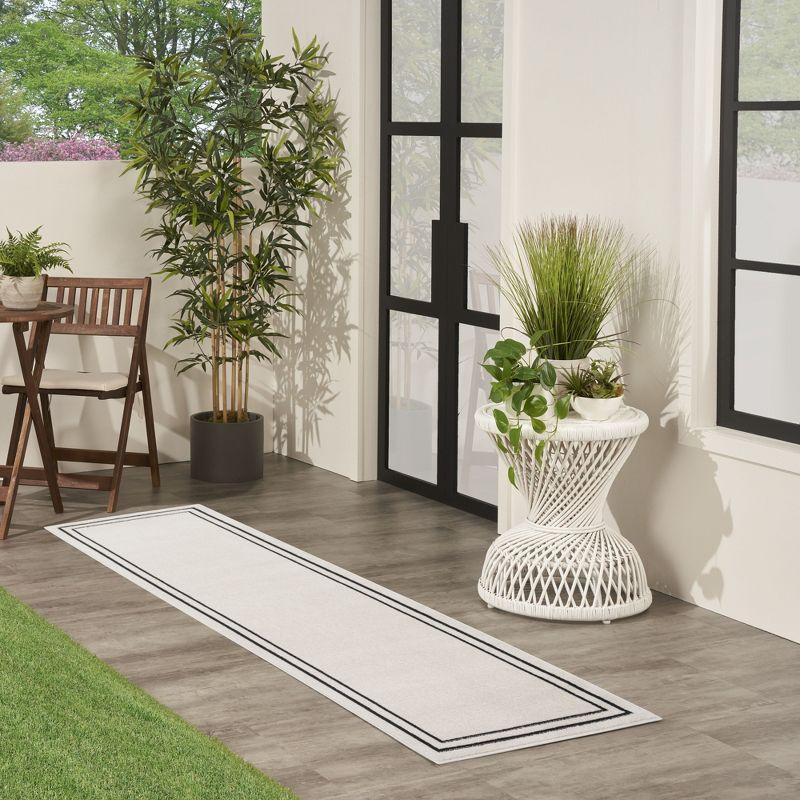 Nourison Essentials Bordered Indoor Outdoor Area Rug