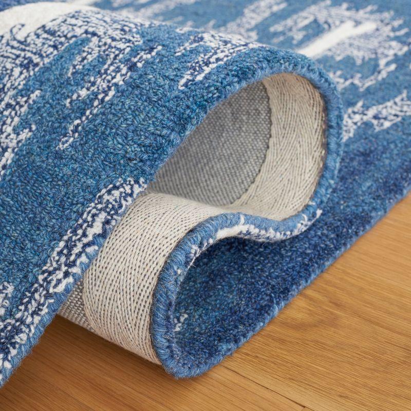 Ikat IKT652 Hand Tufted Area Rug - Blue/Ivory - 8'x10' - Safavieh.