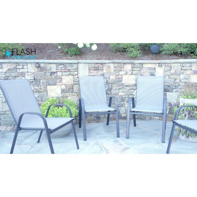 Set of 4 Sleek Black Outdoor Stack Chairs with Flex Comfort