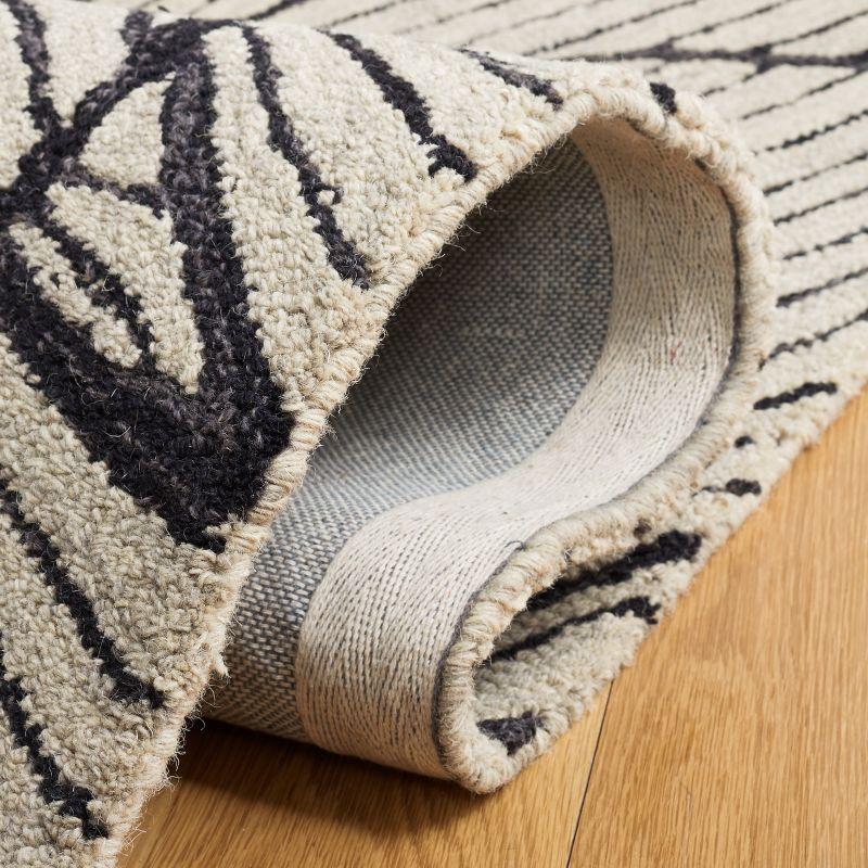 Metro MET451 Hand Tufted Indoor Area Rug - Black/Ivory - 4'x6' - Safavieh