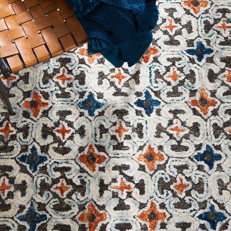 Aspen APN294 Hand Tufted Area Rug - Blue/Taupe - 8'9"x11'9" - Safavieh.