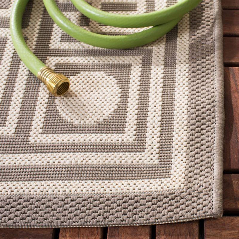 Taupe and Greige Geometric Cotton Synthetic Area Rug