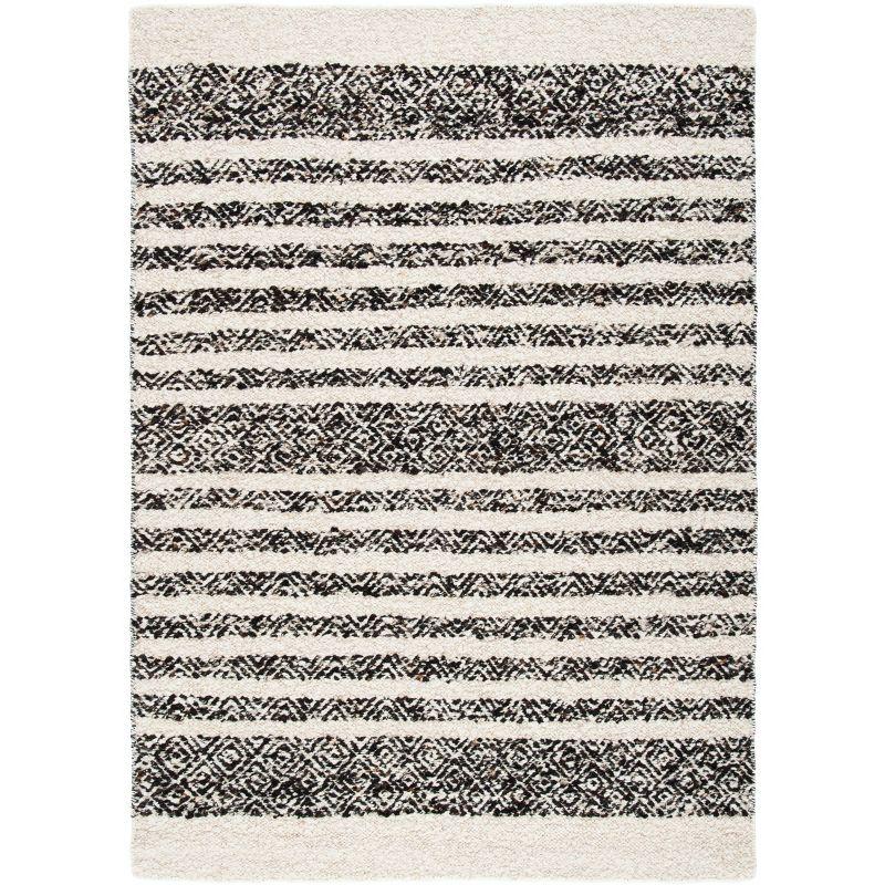 Handmade Black and Ivory Wool Tufted Area Rug 4' x 6'