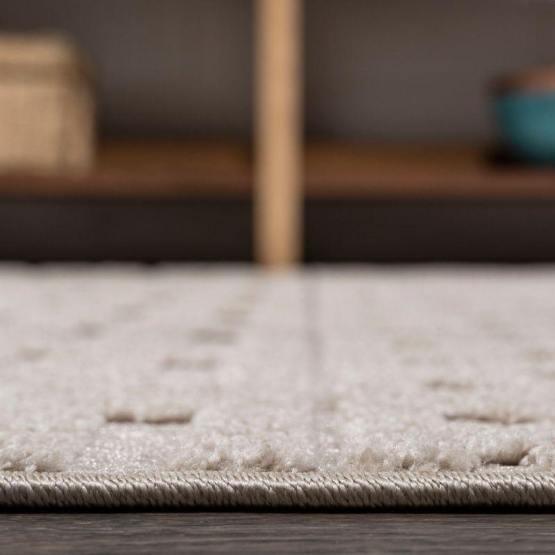 Ivory and Beige Geometric Synthetic Indoor/Outdoor Runner Rug