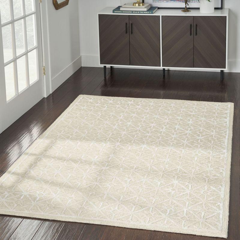 Geometric Handmade Tufted Ivory Area Rug