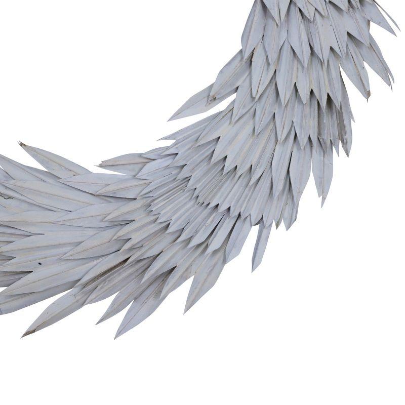 Vickerman Natural Botanicals 24" White Washed Palm Sun Wreath. This wreath measures 24 inches in diameter. It features white washed palm sun leaves on