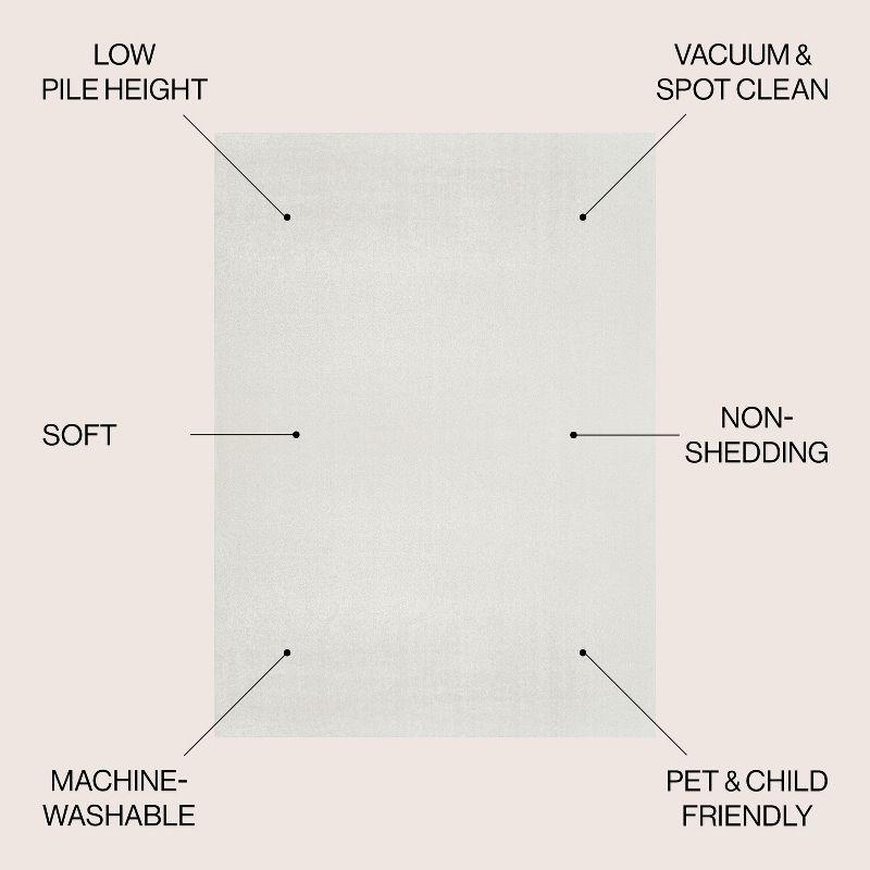 JONATHAN Y Twyla Classic Solid Low-Pile Machine-Washable Cream 4 ft. x 6 ft. Area Rug