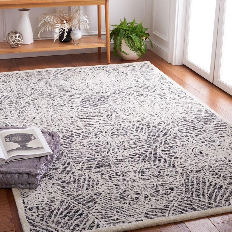 Geesey Hand Tufted Floral Rug